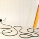Illustration for article titled This Pencil Lamps Power Cord Leaves Doodles Around Your Home